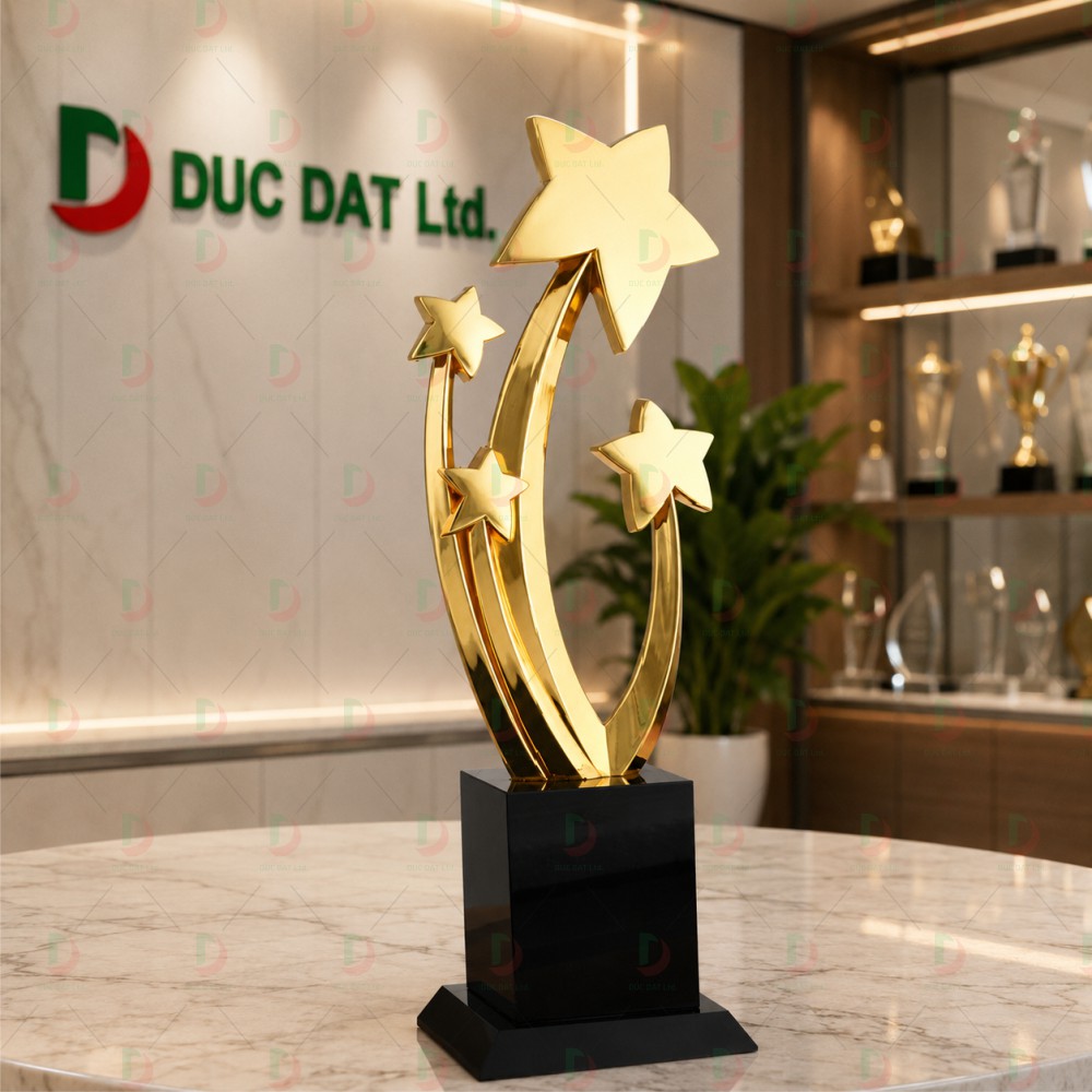 cup_the_thao__45_ Cúp nghệ thuật 004 mạ vàng bóng thiết kế chùm sao vút cao đặt trên chân đế khối màu đen